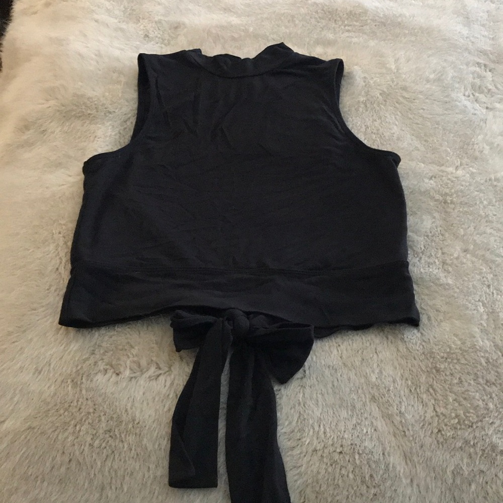 Strut-this open back black top!